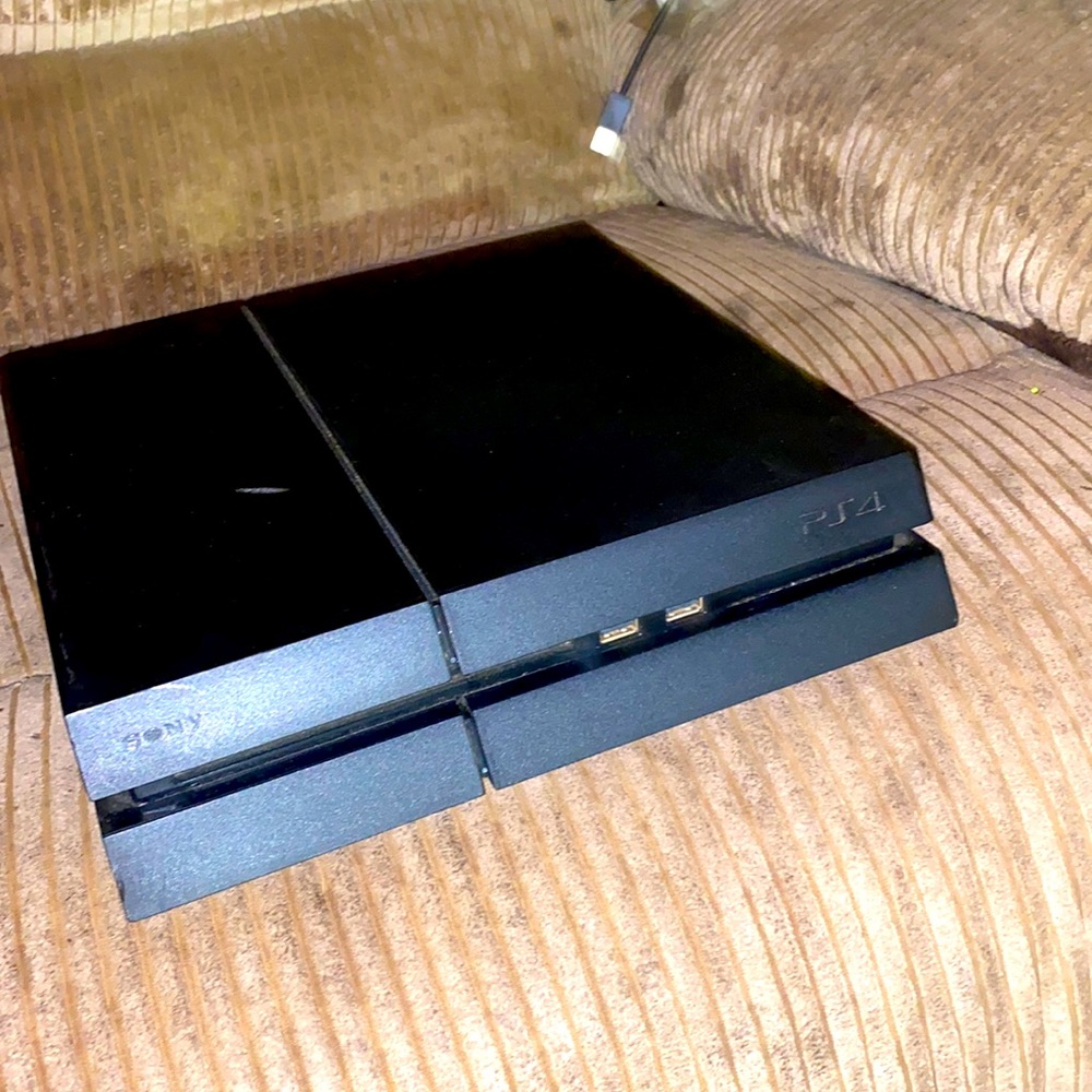PlayStation4 only used twice since bought brand-new. comes with all the wires